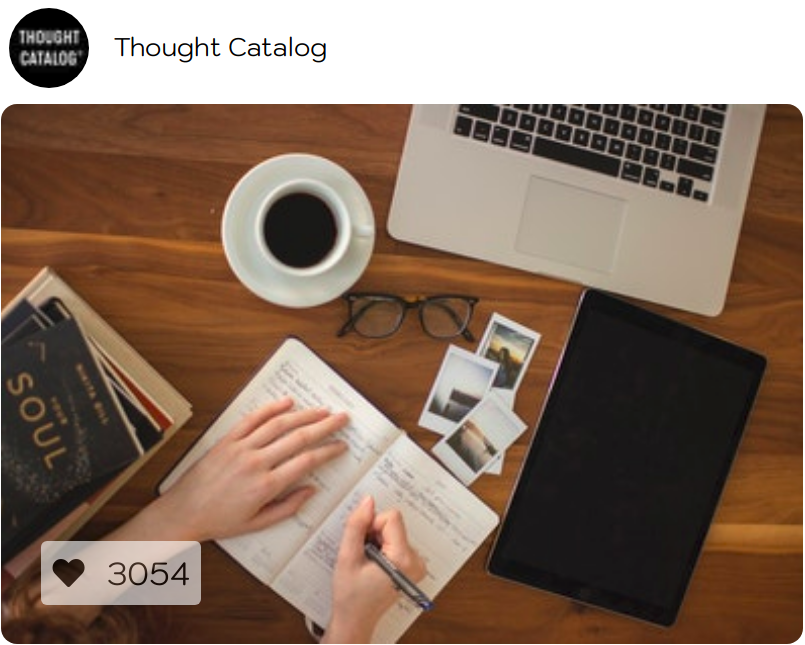 table with mug and computer